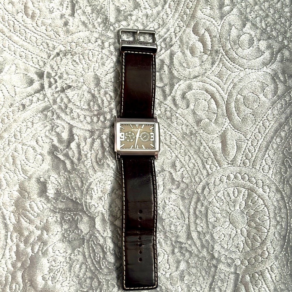 Kenneth Cole Leather strap watch. Can be unisex